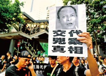胡锦涛出访周永康又放火