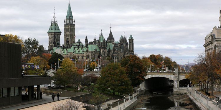 OTTAWA, CANADA - OCTOBER 22: Parliament Hill and National War Memorial site as pictured from Mackenzie King Bridge in downtown, October 22, 2014 in Ottawa, Canada. Officials are investigating multiple reports of shootings and suspects after at least one gunman shot a Canadian soldier and then entered Canada's Parliament building. (Photo by Mike Carroccetto/Getty Images)