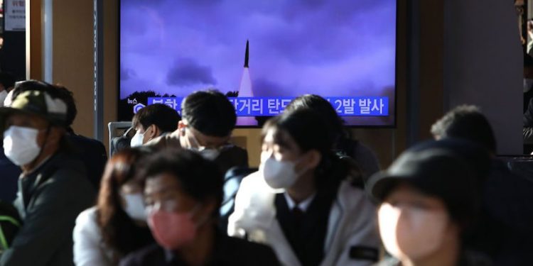 SEOUL, SOUTH KOREA - OCTOBER 28:  People watch a television broadcast showing a file image of a North Korean missile launch at the Seoul Railway Station on October 28, 2022 in Seoul, South Korea. North Korea fired two short-range ballistic missiles (SRBMs) toward the East Sea on Friday, the South Korean military said, as Seoul's major military exercise drew to a close. (Photo by Chung Sung-Jun/Getty Images)