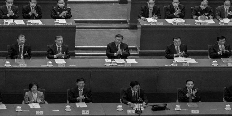 中共二十大報告重申兩岸“統一”一定要實現,並且不放棄武力犯台的選項。(圖片:Kevin Frayer/Getty Images)