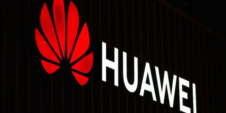 BARCELONA, SPAIN - FEBRUARY 26: A logo sits illumintated outside the Huawei booth on day 2 of the GSMA Mobile World Congress 2019 on February 26, 2019 in Barcelona, Spain. The annual Mobile World Congress hosts some of the world's largest communications companies, with many unveiling their latest phones and wearables gadgets like foldable screens and the introduction of the 5G wireless networks. (Photo by David Ramos/Getty Images)