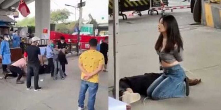 廣州女被捆如文革翻版 內蒙男雙手持刀抗議隔離 (圖片:視頻截圖)