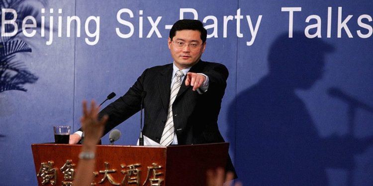 BEIJING - JULY 26: (CHINA OUT) Qin Gang, spokesman of the Chinese delegation listens to a question at a press conference of the Six-party Talks on July 26, 2005 in Beijing, China. Negotiators of the Six-party Talks gathered to start the fourth round on the nuclear program of North Korea in Beijing on July 26. All the delegations participating in the talks have adopted a positive, sincere and pragmatic attitude, according to Qin Gang. (Photo by China Photos/Getty Images)