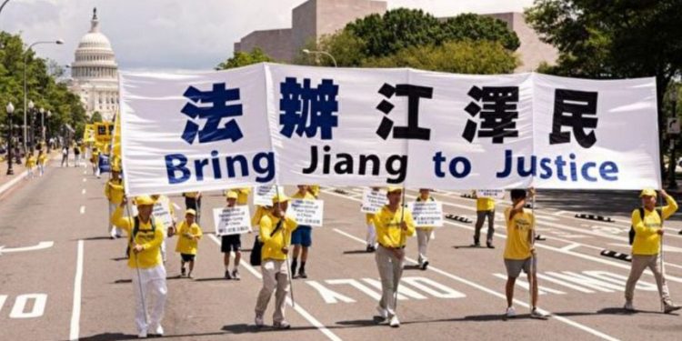 2021年7月20日,法輪功學員們在美國首都華盛頓DC舉行反中共迫害大遊行。(圖片:大紀元資料)