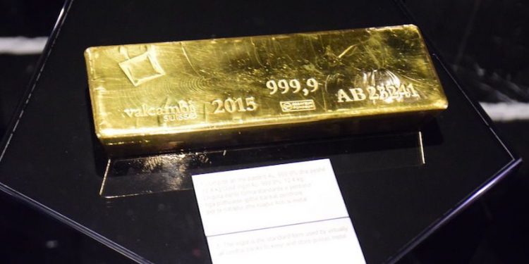 TIRANA, ALBANIA - MAY 07: A gold bar is on display the Museum of the Bank of Albania in Tirana, Albania on May 07, 2022. With coins and banknotes from the past to the present, the Albanian Bank Museum in Albania's capital, attracts visitors. The museum, which opened on October 30, 2015 at the capital's Central Bank building, allows visitors to view a rare collection of coins and banknotes dating from 1912, when Albania gained independence, until the present day. Treasures, coins and banknotes, checks, securities, medallions, personal jewelry with coins, gold bars, commemorative coins issued by the Central Bank to commemorate historical events and figures, and ethnographic artefacts are among the exhibits on display at the museum. (Photo by Olsi Shehu/Anadolu Agency via Getty Images)
