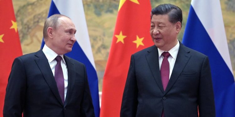 圖為2022年2月俄羅斯總統普京（左）與中共國家主席習近平（右）會晤。（圖取自twitter.com/KremlinRussia_E）