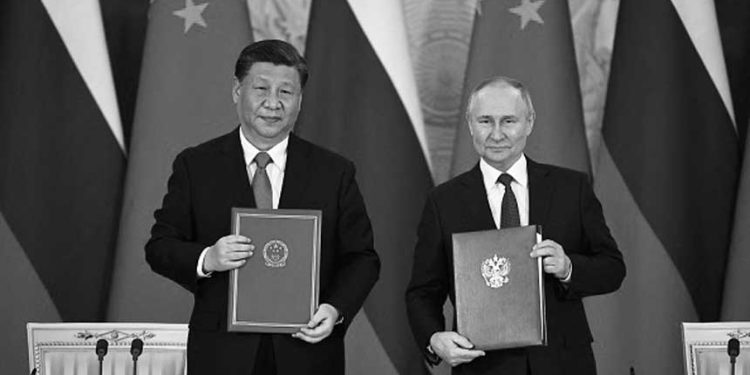美智庫專家:中俄聯盟構成史上對美最大威脅 (圖片:MIKHAIL TERESHCHENKO/SPUTNIK/AFP via Getty Images)