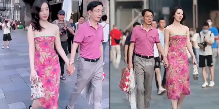 中石油領導和異性街頭牽手(圖片來源:視頻截圖)