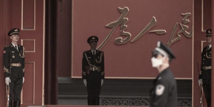 Security personnel stand guard at Zhongnanhai near Tiananmen Square ahead of China's 20th Communist Party Congress in Beijing on October 13, 2022. (Photo by Noel Celis / AFP) (Photo by NOEL CELIS/AFP via Getty Images)
