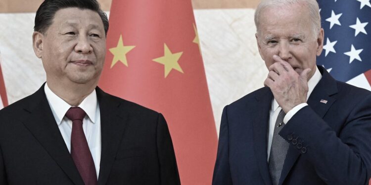 US President Joe Biden (R) and China's President Xi Jinping (L) meet on the sidelines of the G20 Summit in Nusa Dua on the Indonesian resort island of Bali on November 14, 2022. (Photo by SAUL LOEB / AFP) (Photo by SAUL LOEB/AFP via Getty Images)