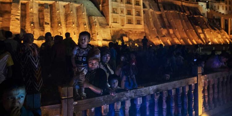 中共在新疆推「民族互嵌」惡法 (圖片:Kevin Frayer/Getty Images)