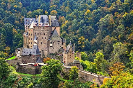 German famous fairytale hill castle in early autumn