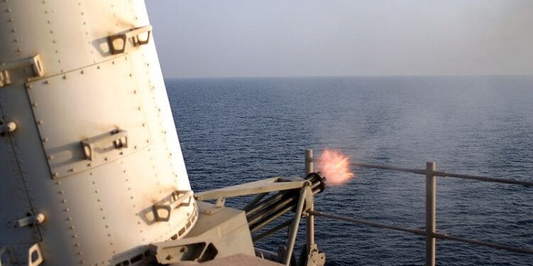 20041017-N-0922G-001..Arabian Gulf (Oct. 17, 2004) – Destroyer USS Spruance (DD 963) conducts a Close-in .Weapons System (CWIS) live fire during a Pre-Aim Calibration Fire (PACFIRE) in the Arabian Gulf. CWIS is a fast-reaction, rapid-fire 20-millimeter gun system that provides U.S. Navy ships with a terminal defense against anti-ship missiles that have penetrated other fleet defenses. Spruance is deployed to the Arabian Gulf in support of the Global War on Terrorism. U.S. Navy photo by Intelligence Specialist 1st Class Ralph F. Gibbs (RELEASED).