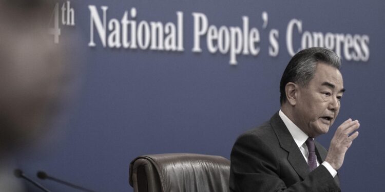 BEIJING, CHINA - MARCH 7: Chinese Foreign Minister Wang Yi speaks during a press conference for domestic and foreign journalists as part of the National People's Congress and Two Sessions on March 7, 2024 in Beijing, China. China's annual political gathering known as the Two Sessions convenes leaders and lawmakers to set the government's agenda for domestic economic and social development for the year. (Photo by Kevin Frayer/Getty Images)
