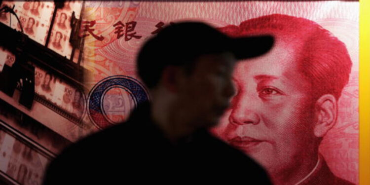 BEIJING - DECEMBER 09: A man walks past a billboard featuring the late chaiman Mao Zedong on a Chinese banknote at a finance exhibition held by the People's Bank of China on December 9, 2005 in Beijing, China. China's banking regulatory body says the full opening up of its banking sector will go ahead as scheduled under WTO rules, while warning the government will no longer inject fresh capital into unprofitable banks. (Photo by Guang Niu/Getty Images)
