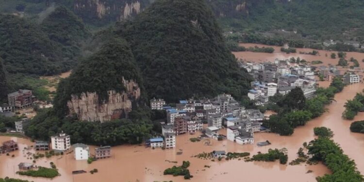 TOPSHOT - This photo taken on June 7, 2020 shows submerged streets and inundated buildings after heavy rain caused flooding in Yangshuo, in China's southern Guangxi region. (Photo by STR / AFP) / China OUT (Photo by STR/AFP via Getty Images)