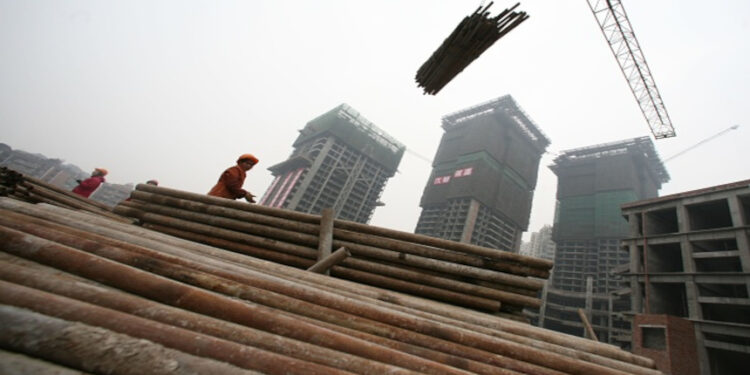 中國經濟下滑,專家預計中國大型民企破產將不斷出現。(圖片來源:China Photos/Getty Images)