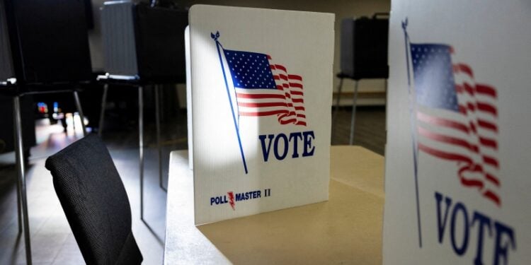 FILE PHOTO: A view shows an empty voting booth at a polling location as the Democratic and Republican parties hold primary elections in Dayton, Ohio, U.S. March 19, 2024. REUTERS/Megan Jelinger/File Photo
