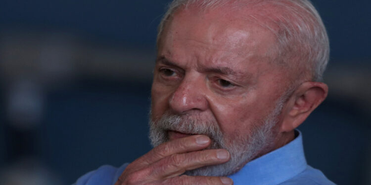 FILE PHOTO: Brazil's President Luiz Inacio Lula da Silva speaks during the arrival of Brazilian citizens from Lebanon, in Guarulhos, Brazil, October 6, 2024. REUTERS/Carla Carniel/File Photo
