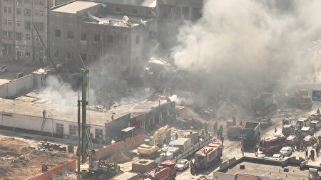 LANGFANG, CHINA - MARCH 13: Aerial view of smoke rising from buildings after an explosion occurred at 7:55 am at the residential community in Xiaozhangezhuang village of Yanjiao on March 13, 2024 in Langfang, Hebei Province of China. (Photo by Zhong Ming/VCG via Getty Images)