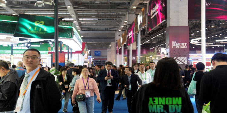 Visitors attend the China International Import Expo (CIIE) in Shanghai, China November 6, 2024. REUTERS/Nicoco Chan