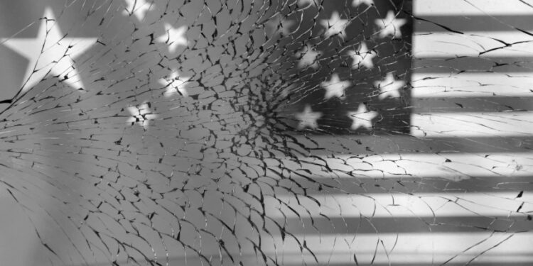 FILE PHOTO: U.S. and Chinese flags are seen through broken glass in this illustration taken, January 30, 2023. REUTERS/Dado Ruvic/Illustration/File Photo