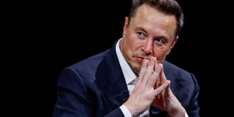 FILE PHOTO: Elon Musk, Chief Executive Officer of SpaceX and Tesla, gestures as he attends the Viva Technology conference dedicated to innovation and startups at the Porte de Versailles exhibition centre in Paris, France, June 16, 2023. REUTERS/Gonzalo Fuentes/File Photo